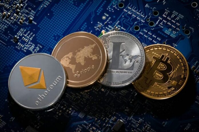in-this-photo-illustration-model-coins-of-the-cryptocurrencies-and-picture-id910140816