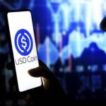 In This Photo Illustration, A Woman Holds A Smartphone With